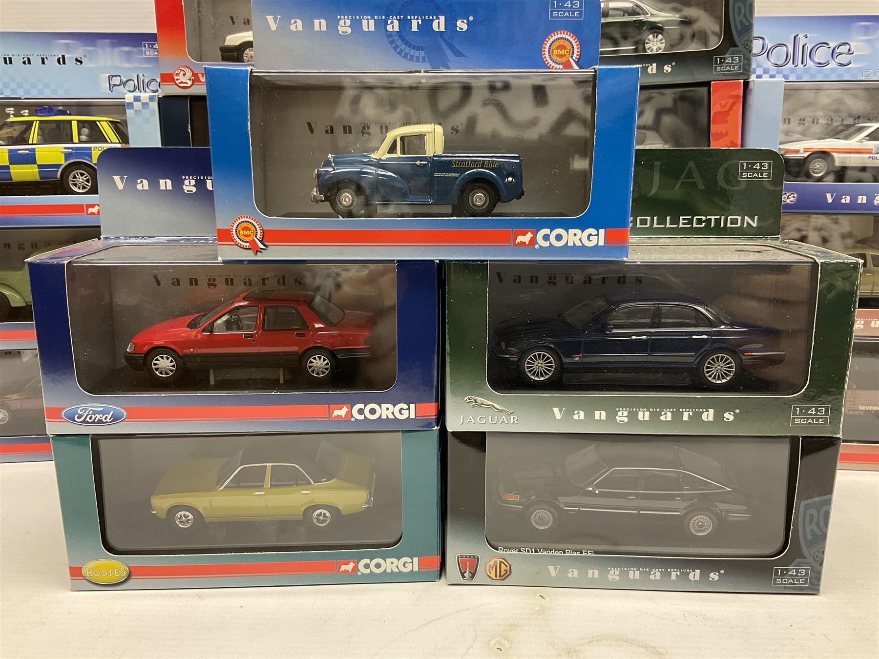 Lledo and Vanguard 1:43 scale die-cast models including Land Rover, Vauxhall, MG, Police and others, all boxed (21)