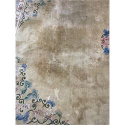 Large Chinese washed woollen carpet, pale sage green ground and decorated with flowers