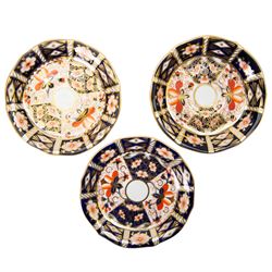 Royal Crown Derby teacups, comprising 4971 Imari pattern trio, two Imari 2541 trios and three Imari pattern 2541 cups and saucers