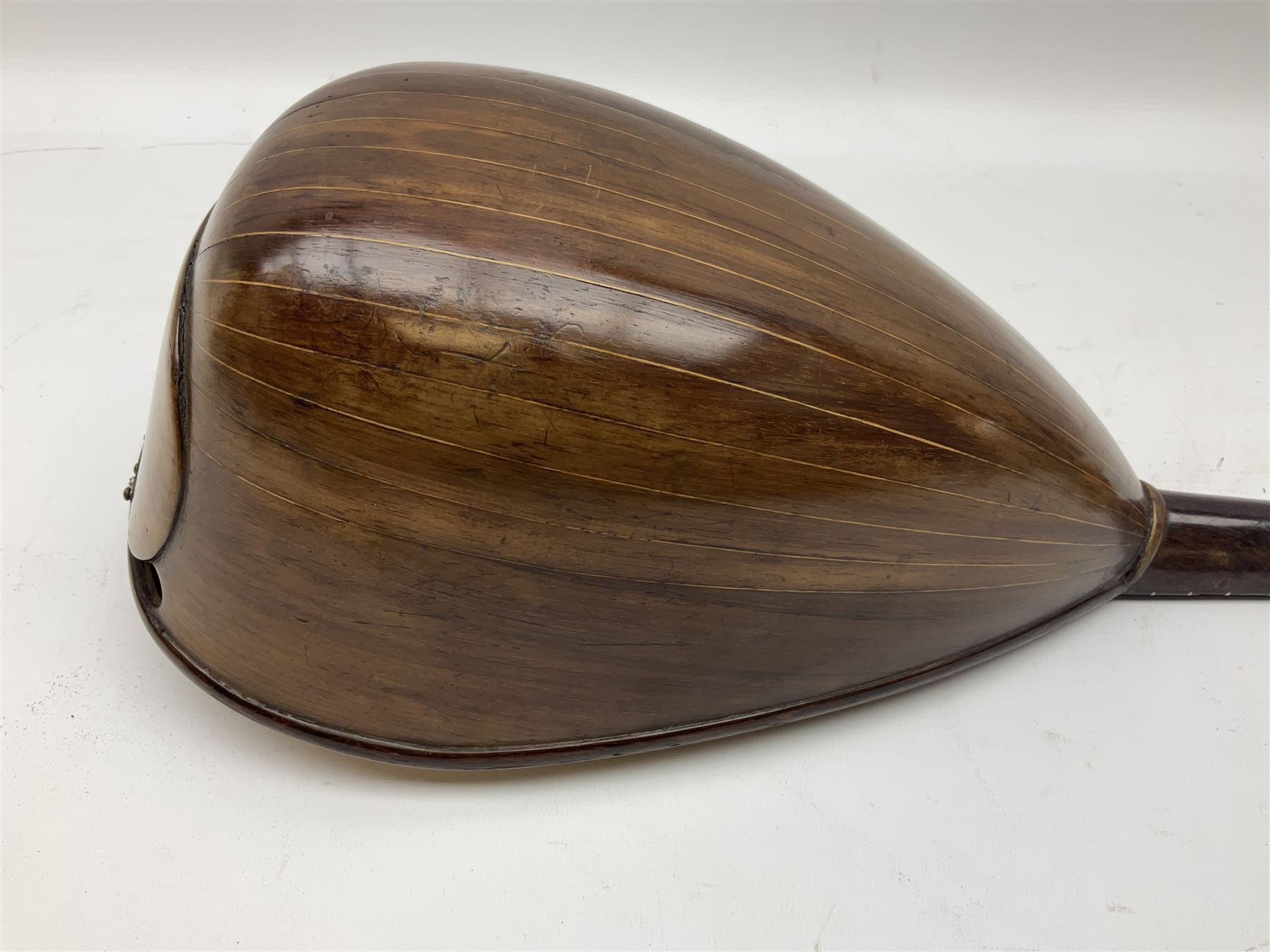 Italian mandolin, with foliate inlaid scratchplate, paper label inscribed 'Carlo Loveri & Figlio of Napoli', L62cm