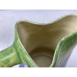 Seven Myott Son & Co hand painted jugs, all with printed mark beneath, H21cm