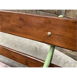 Cast iron and wood slate bench painted in green