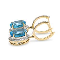 Pair of 14ct gold Swiss blue topaz and diamond pendant earrings, each stud suspending a single oval cut topaz, surrounded by single cut diamonds, to a diamond set bail, total topaz weight approx 8.00 carat