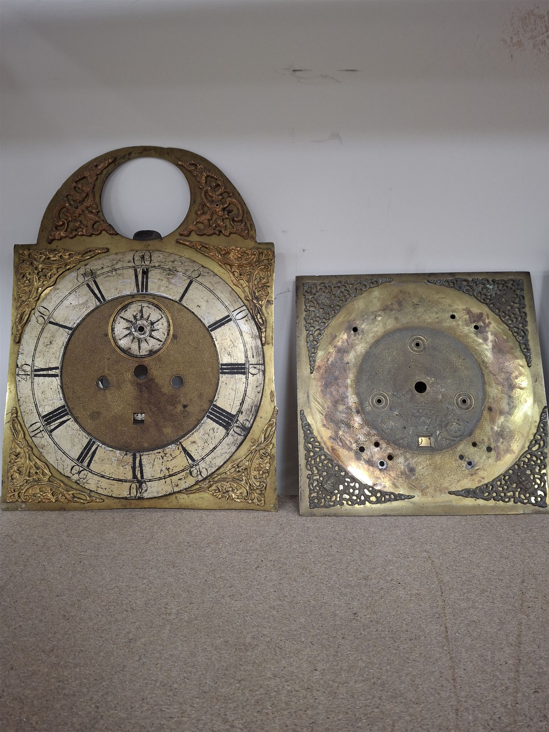 Approximately twenty-two longcase and wall clock dials, 18th century and later, included painted and brass examples