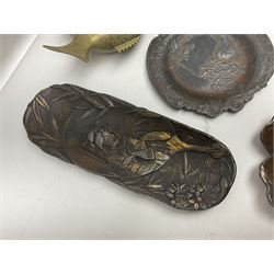 Brass sunfish ashtray, Chinese silver plated trinket box with mirror, bronzed matchbox cover and a collection of other Oriental bronzed embossed metal trays