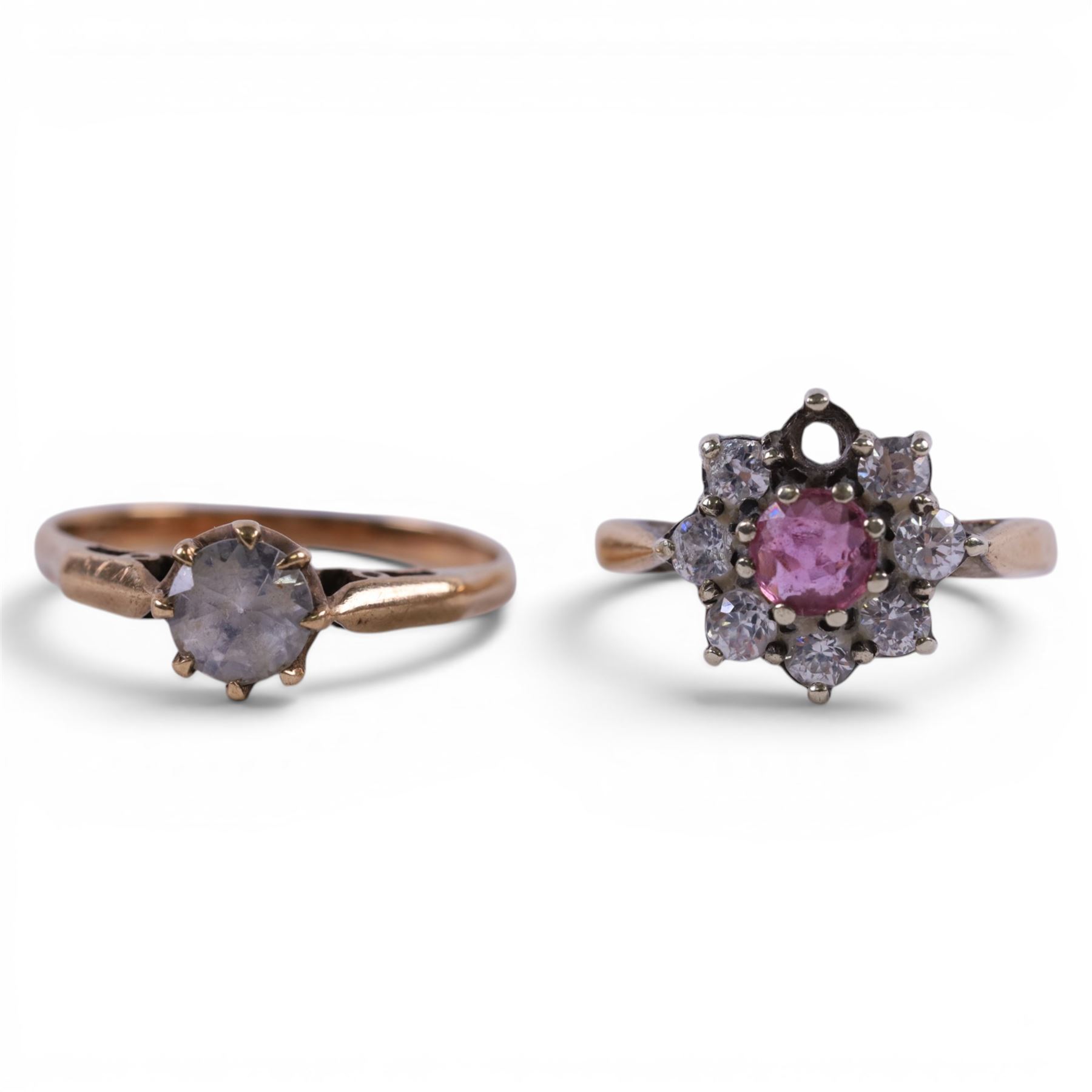 Four 9ct gold rings, including cameo and three stone set examples
