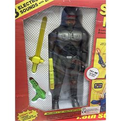 PMS Lightning 1:8 scale remote control racing car; Soma Sonic Man battery operated electronic sounds and light action figure; and CGL Galaxy Invader 10000 computer space battle game; all boxed (3)