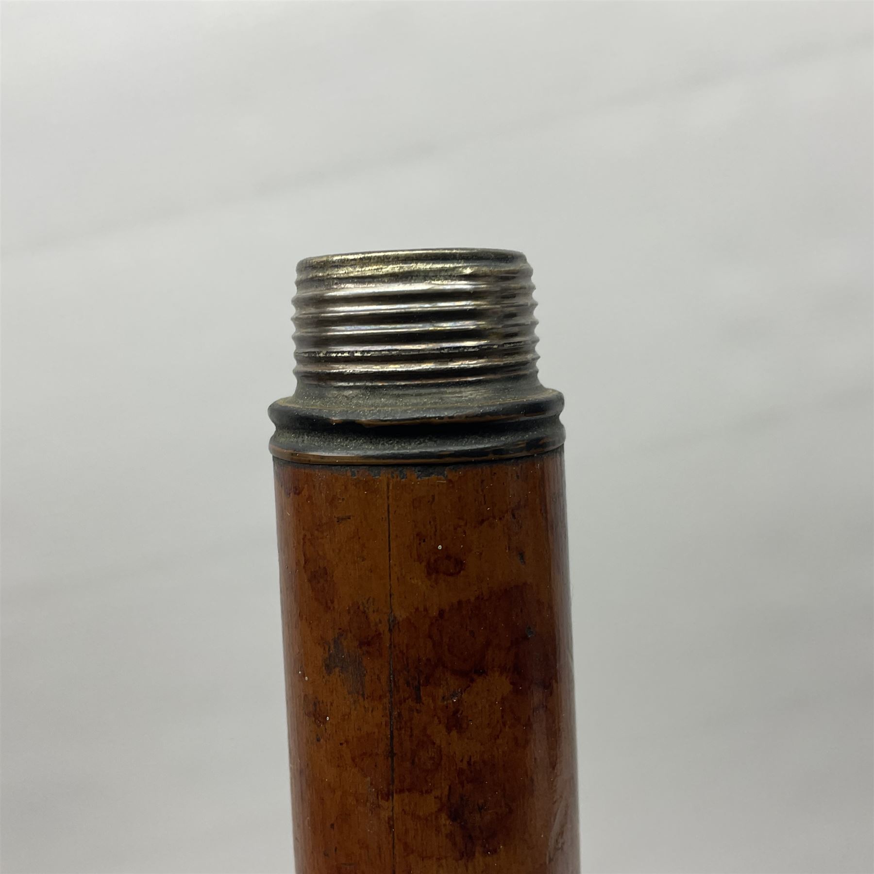 19th century malacca walking cane, the screw threaded domed cover opening to reveal vacant recess, above a further screw threaded opening revealing a removable glass vial with stopper, glass vial L41cm, cane L89.5cm