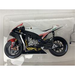 Three Ixo Models 1:12 scale die-cast models of motorcycles - BRB007 Honda NSR500 Michael Doohan 1998; BRB001 Honda RC211V Valentino Rossi 2003; and Yamaha YZR-M1 Colin Edwards MotoGP Phillip Island 2007; all boxed (3)