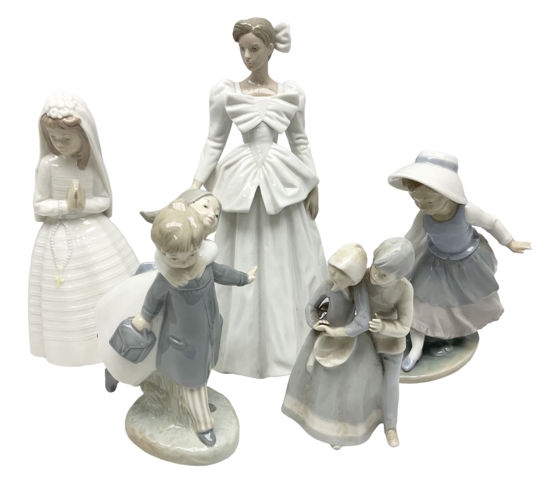 Three Nao figures comprising The Next Dance 1201 and Girls First Communion 0236, and young girl wearing a hat, together with two further Spanish style figures