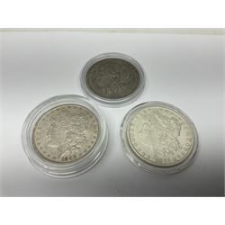 Three United States of America silver Morgan dollar coins dated 1881 O, 1882 and 1882 O