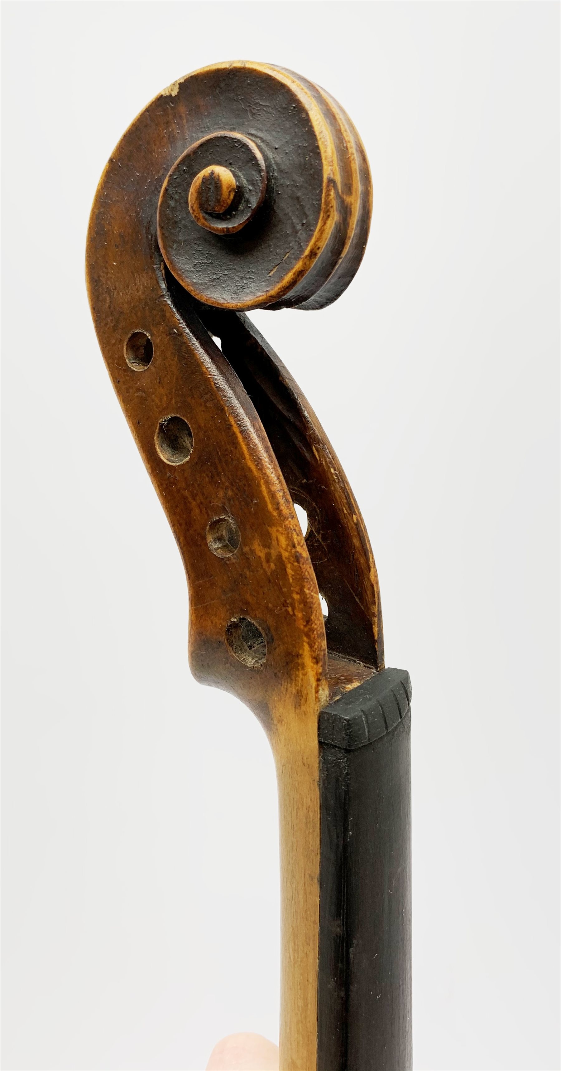  Late 19th century German violin for completion with 36cm one-piece maple back and ribs and spruce top, bears label Copie De Albani Palermo 1633, 59cm overall together with three books on violin construction, restoration and varnishing  