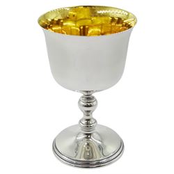 Modern Irish silver goblet, the plain circular bowl with slightly flared rim and gilt interior, upon a baluster knopped stem and spreading circular foot with stepped edge, hallmarked Royal Irish Silver Co, Dublin 1971, also bearing import marks for Sheffield Assay Office, Sheffield 1970, and stamped 925, H14cm, approximate weight 9.38 ozt (291.8 grams)