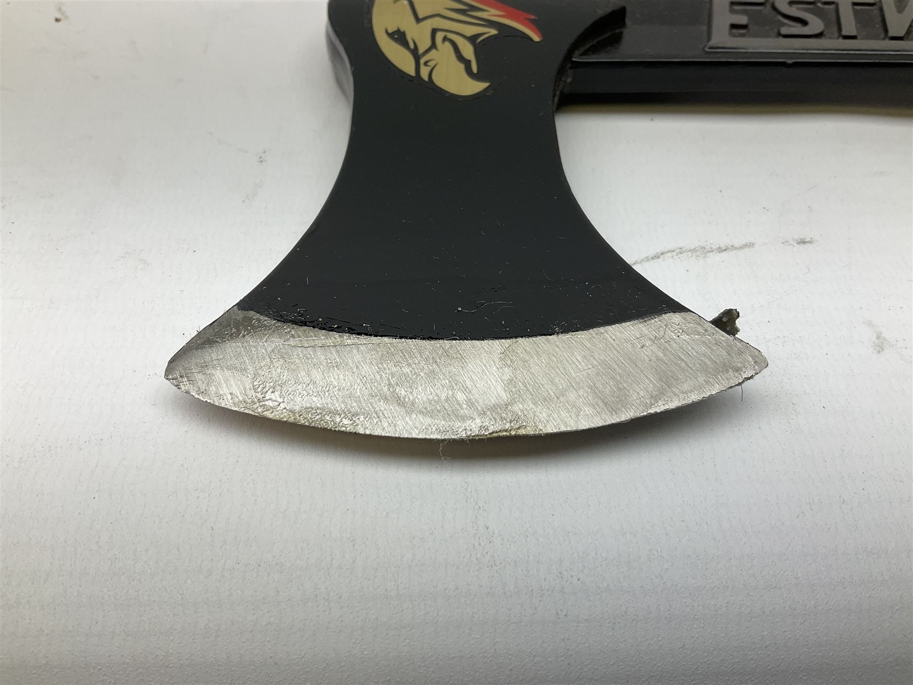 Estwing Black Eagle style double bit throwing axe with leather grip, virtually mint with labels present, plastic blade protectors and nylon sheath L43cm; another smaller Estwing axe stamped 24A to the pommel, with leather grip and sheath; and a vintage short handled hedge knife, the blade stamped IH (?) No.2 (3)