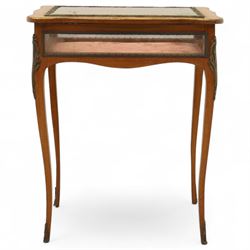 Louis XV revival style walnut bijouterie table, rectangular serpentine form, with brass edging and a hinged floral marquetry inlaid lid with bevelled glass top and sides, gilt-bronze beaded border, interior lined with rich red velvet, raised on slender cabriole legs with gilt bronze masks and sabots, circa 1900