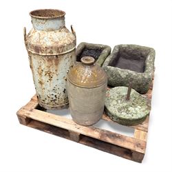 Two 19th century stone troughs, with mill stone, flagon and metal milk churn 