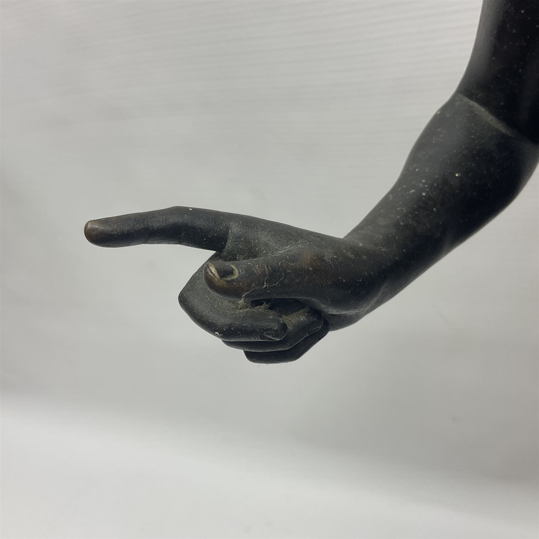 Bronzed classical nude male figure, upon a stepped circular base, H61cm 