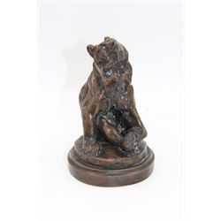 After Georges Gardet, bronzed model of a Sitting Bear, stamped 'G Gardet' to the circular base, also bearing foundry stamp 'Fondeur Siot Decauville Paris', H15.5cm
