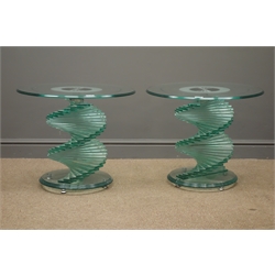  Pair glass tables, circular top, frosted and brush steel patterning, twisting stepped column on three graduating platforms, four supports, W60cm, H51cm  