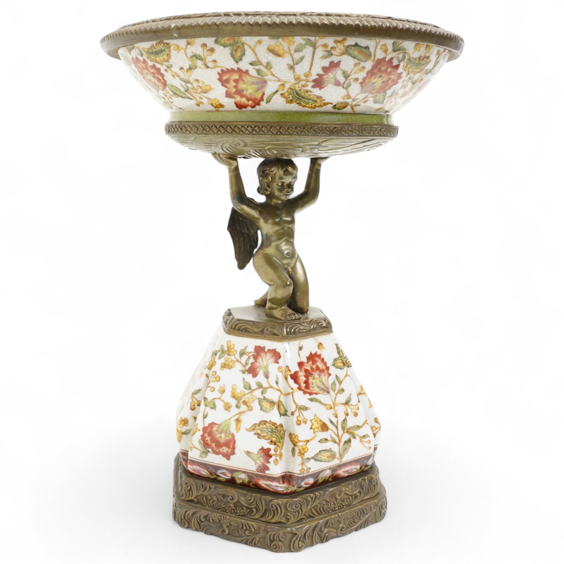 Wong Lee comport, with polychromatic enamel floral decoration, the stem formed as kneeling cherub, marked to base, H37cm 