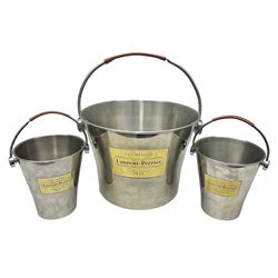 Stainless steel Laurent-Perrier champagne bucket, with engraved brass plaque and grip to swing handle, together with two matching smaller, largest D38cm (3)