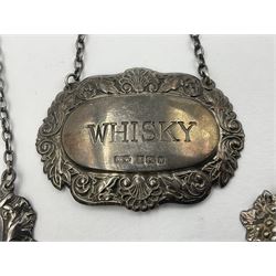 Five modern silver decanter labels, to include three similar Sherry and Brandy examples embossed with scrolls, two hallmarked C Robathan & Son, Birmingham 1989, and one hallmarked Laurence R Watson & Co, Birmingham 1987, together with a scotch example, hallmarked A Marston & Co, Birmingham 1970, and a larger sherry example, embossed with fruiting vines, hallmarked A Marston & Co, Birmingham 1993