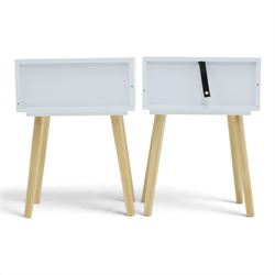 Contemporary pair of white single drawer bedsides, raised on tapering light wood supports