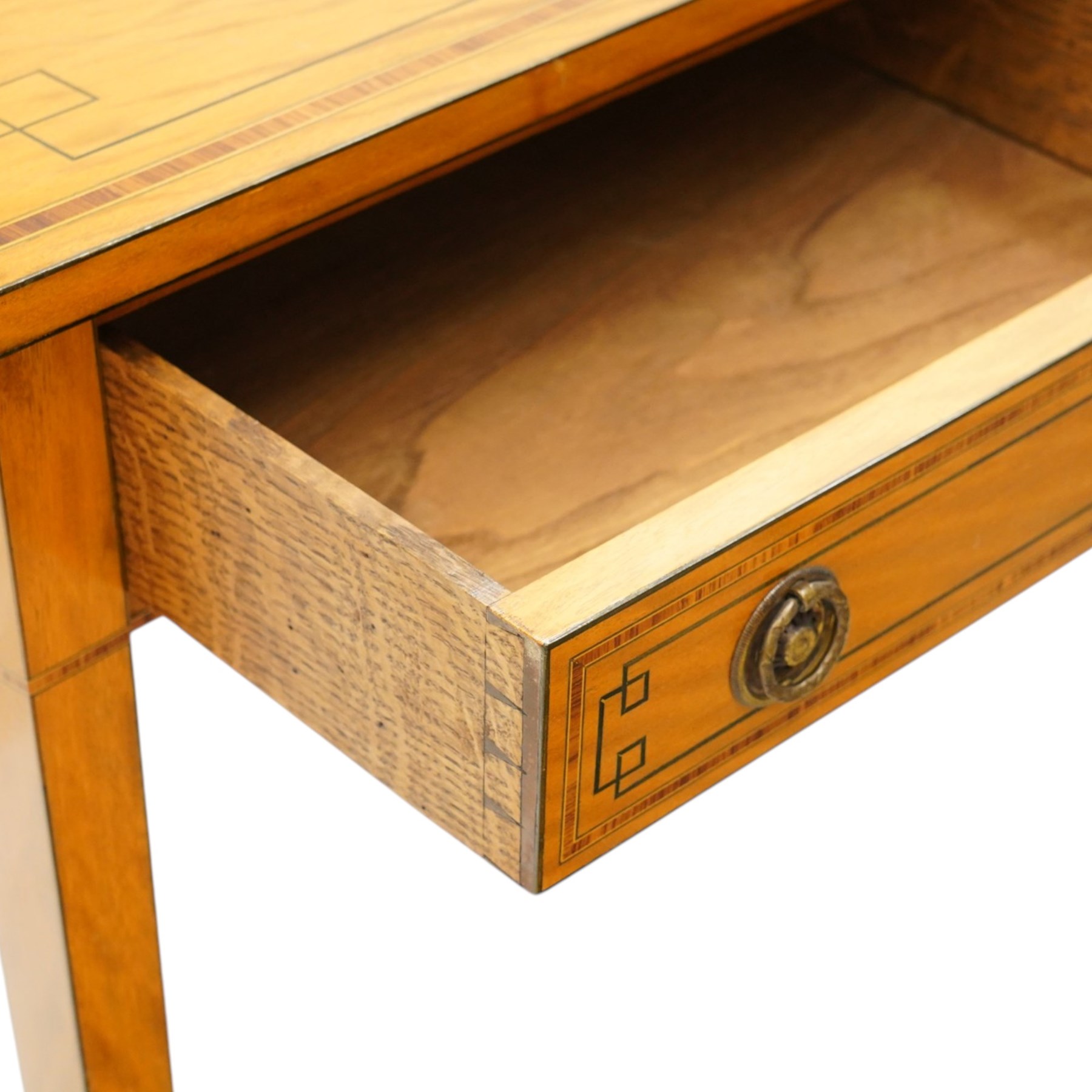 Pair of George III design inlaid satinwood console or side tables, rectangular top with mahogany cross-banding and ebony stringing, fitted with two drawers with brass ring handles, on square tapering supports with brass cups and castors