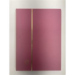 Mostly Great British stamps, including King Edward VII two shillings and sixpence, five shillings and ten shillings, King George V seahorses, King George VI high values, Queen Elizabeth II pre and post decimal etc, housed in a pink stockbook 