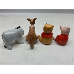 Set of eight Winnie the Pooh Beswick figures, comprising Christopher Robin, Winnie the Pooh, Tigger, Piglet, Rabbit, Eeyore, Owl and Kanger, six with original boxes, tallest H12cm  
