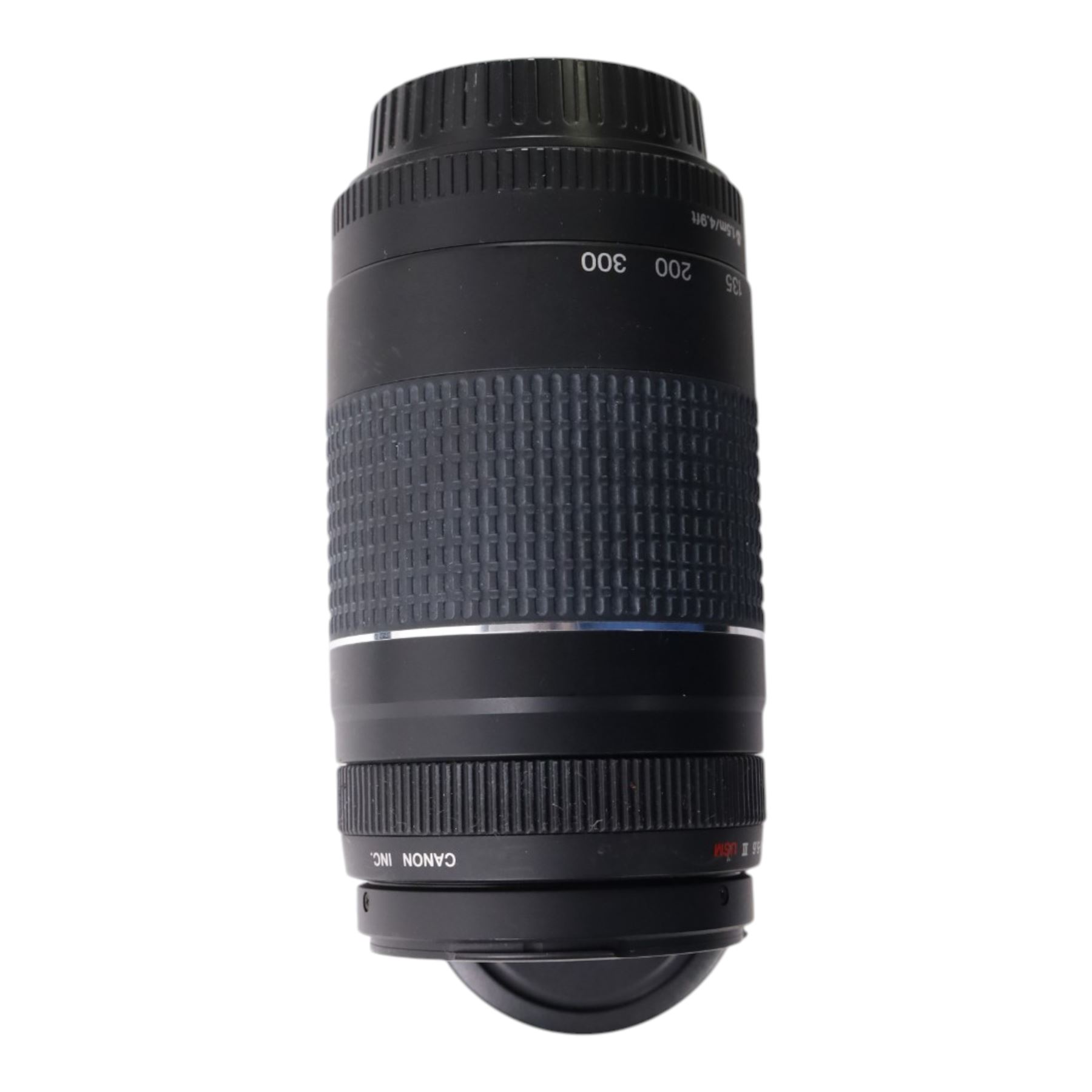 Eight camera lenses, comprising Canon Ultrasonic Zoom EF 75-300mm 1:4-5.6 lens, AF Nikkor 35-70mm 1:3.3-4.5 lens, Nikkor 60-180mm 1:4.5-5.6 lens, Canon Zoom EF 28-80mm 1:3.5-5.6 lens, Canon Zoom EF 80-200mm 1:4.5-5.6 lens, Sigma 70-300mm 1:4.6-5.6 DL Macro, Sigma Zoom 70-210mm 1:4-5.6 UCII lens and a Sigma AF 70-300mm 1:4-5.6 APO Macro lens, all with lens caps