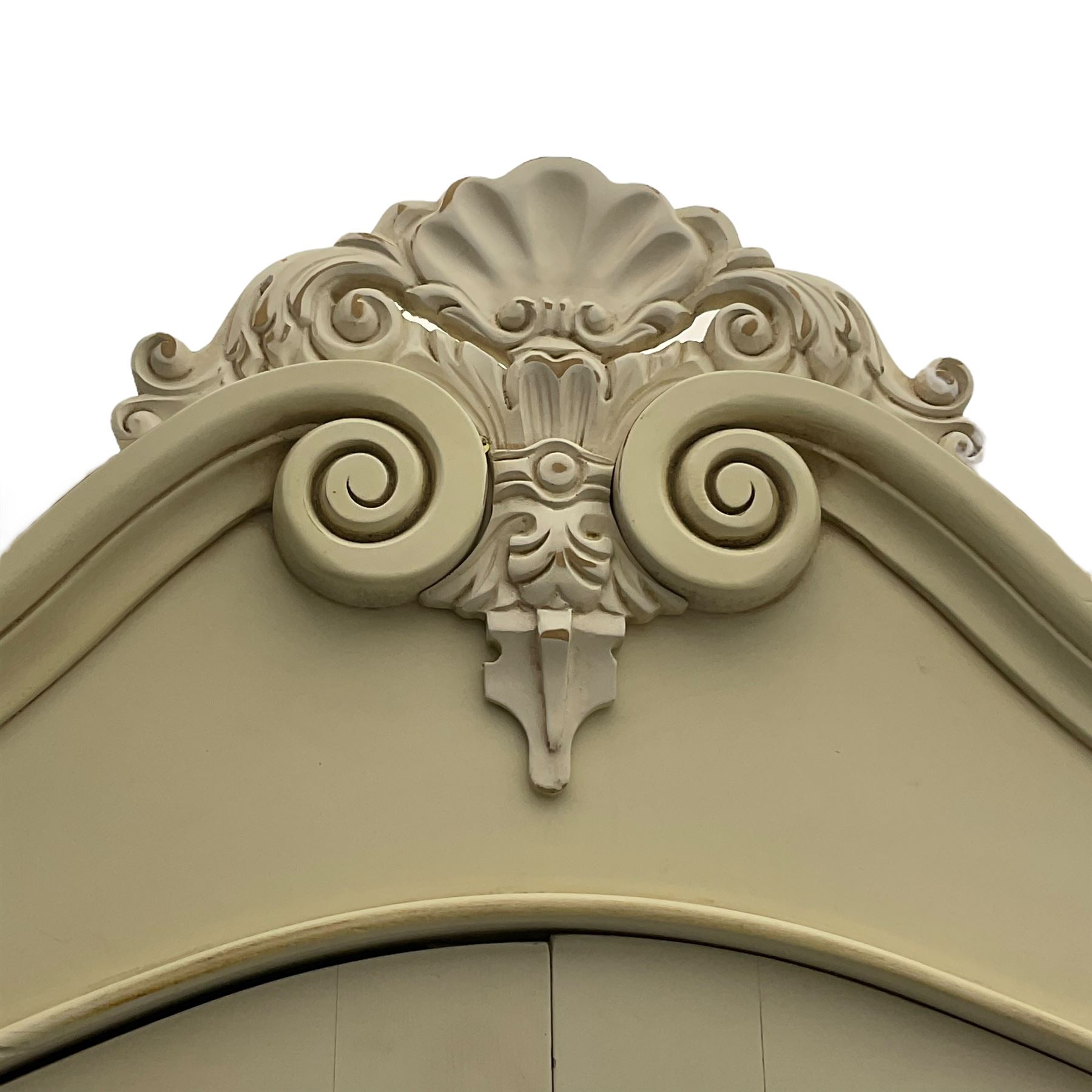 French design cream painted armoire wardrobe, shaped top with shell and flower head pediment, enclosed by two mirror glazed doors, the base fitted with single drawer