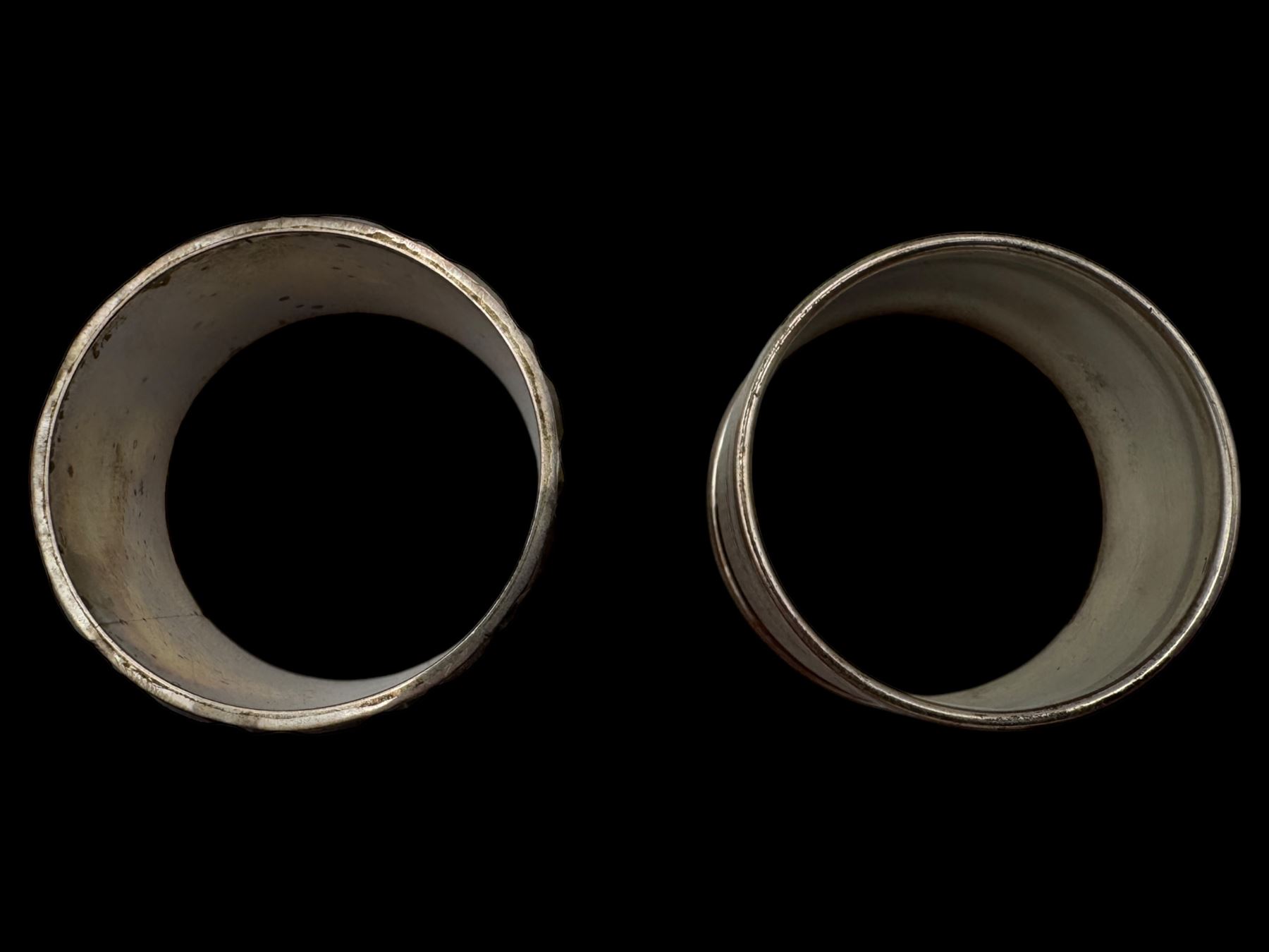 Silver cream jug and two napkin rings, all hallmarked 