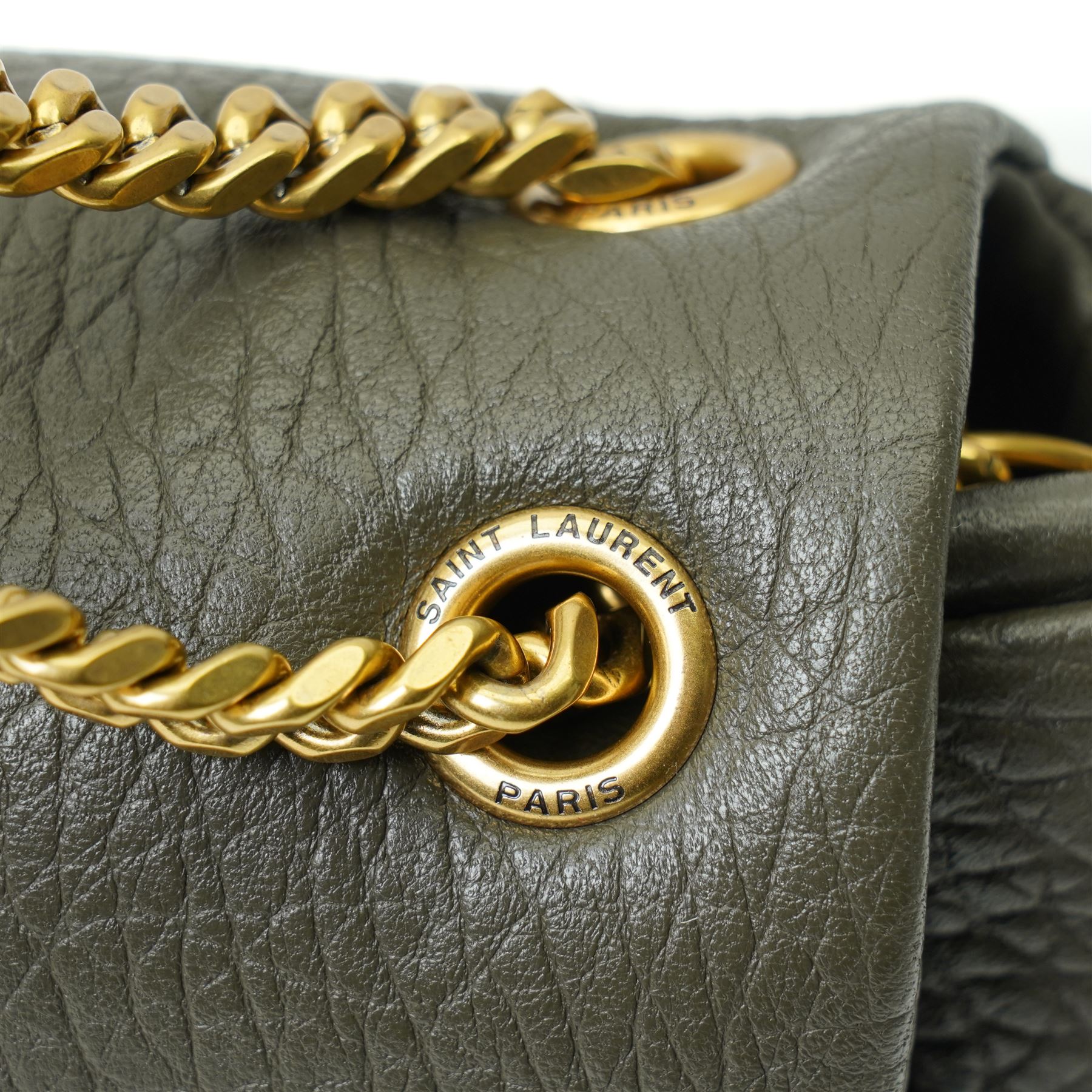 Yves Saint Laurent Calypso large shoulder bag, grey grained leather with envelope flap and gold-tone Cassandre monogram, sliding chain and leather shoulder strap, magnetic fastening, interior lined in black textile with zip pocket and leather brand tab stamped Saint Laurent Paris, made in Italy, together with original Saint Laurent dust bag, W37cm D10cm H22cm