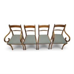 19th century mahogany extending dining table, rectangular top with rounded corners raised on turned and fluted supports with brass cups and castors, with two additional leaves; with set of eight (6+2) Regency design mahogany dining chairs, spiral-reeded back-bar over drop-in seats and sabre supports (W54cm H85cm)