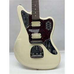 Mexican Fender Jaguar electric guitar with Humbucker pick-ups and tremolo arm, serial no.MX16741977, L101cm; in soft carrying case