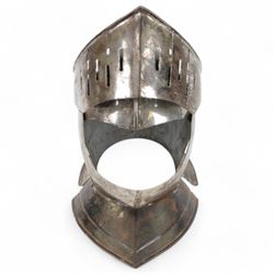 Reproduction 17th century European close helmet, the visor with elongated sights, two-piece skull with a high medial roped comb