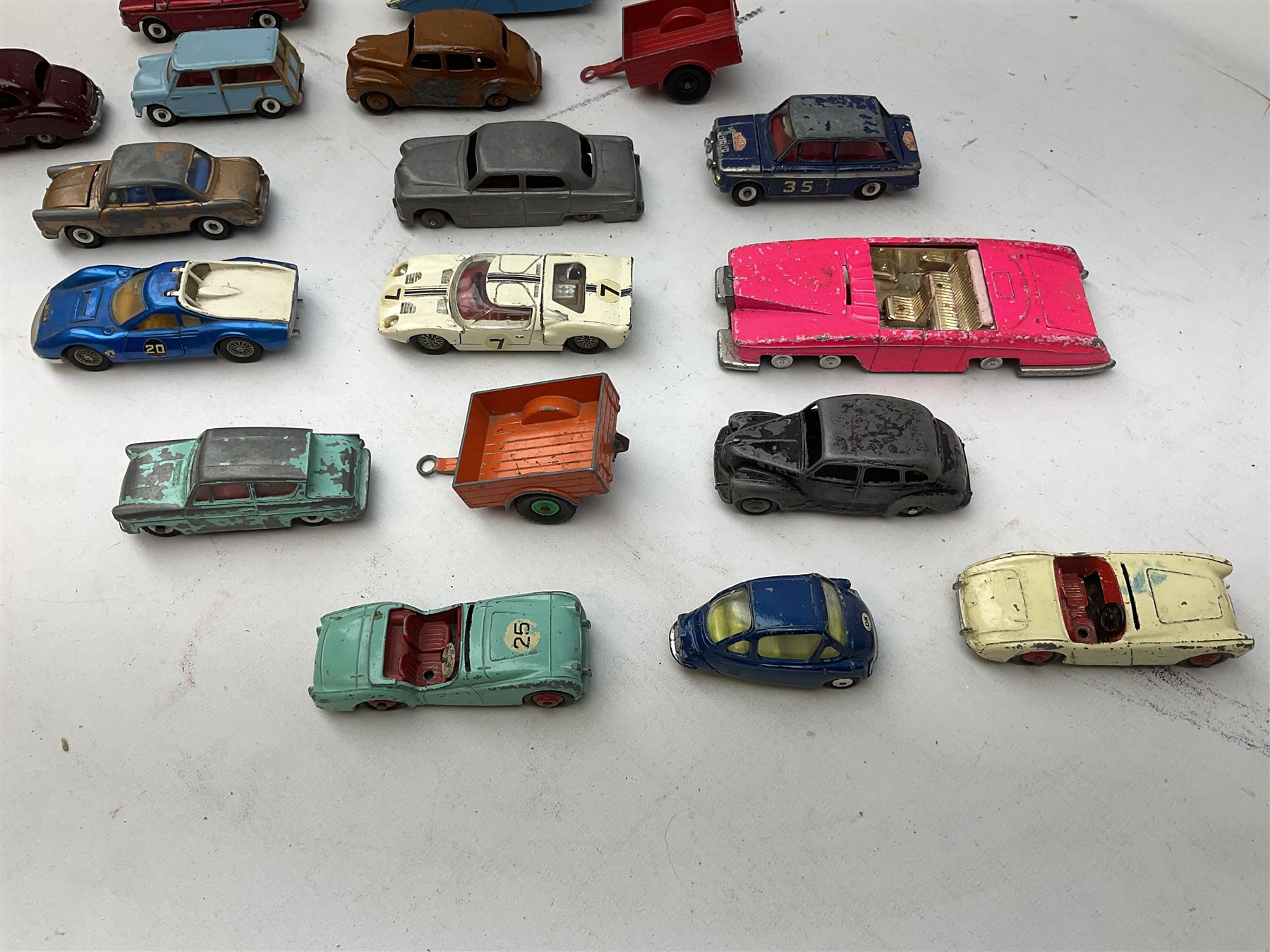Dinky - twenty-five unboxed and playworn die-cast models including Lady Penelope FAB1, Caravan, Ford Sedan, Triumph TR2, Packard, Austin Somerset, Devon, Healey and Seven Countryman etc (25)