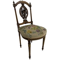 Late Victorian walnut side chair, arched cresting rail over carved and pierced splat depicting baskets and foliage, floral needle work upholstered seat, on acanthus carved and fluted turned supports