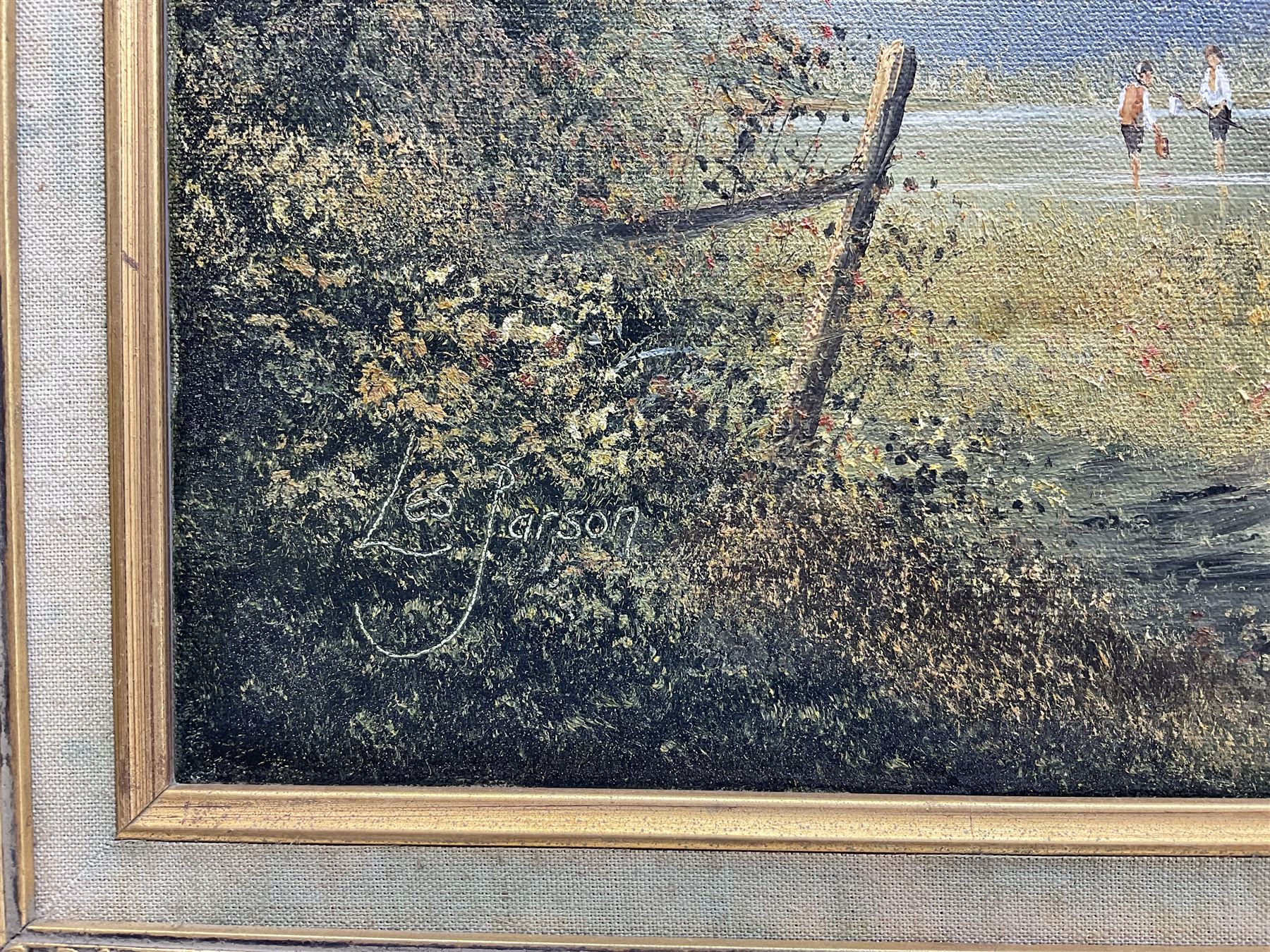 Les Parson (British 1945-): Young Boys Playing on the Lake and Moored Sailing Boats, two oils on canvas signed max 50cm x 76cm (2)