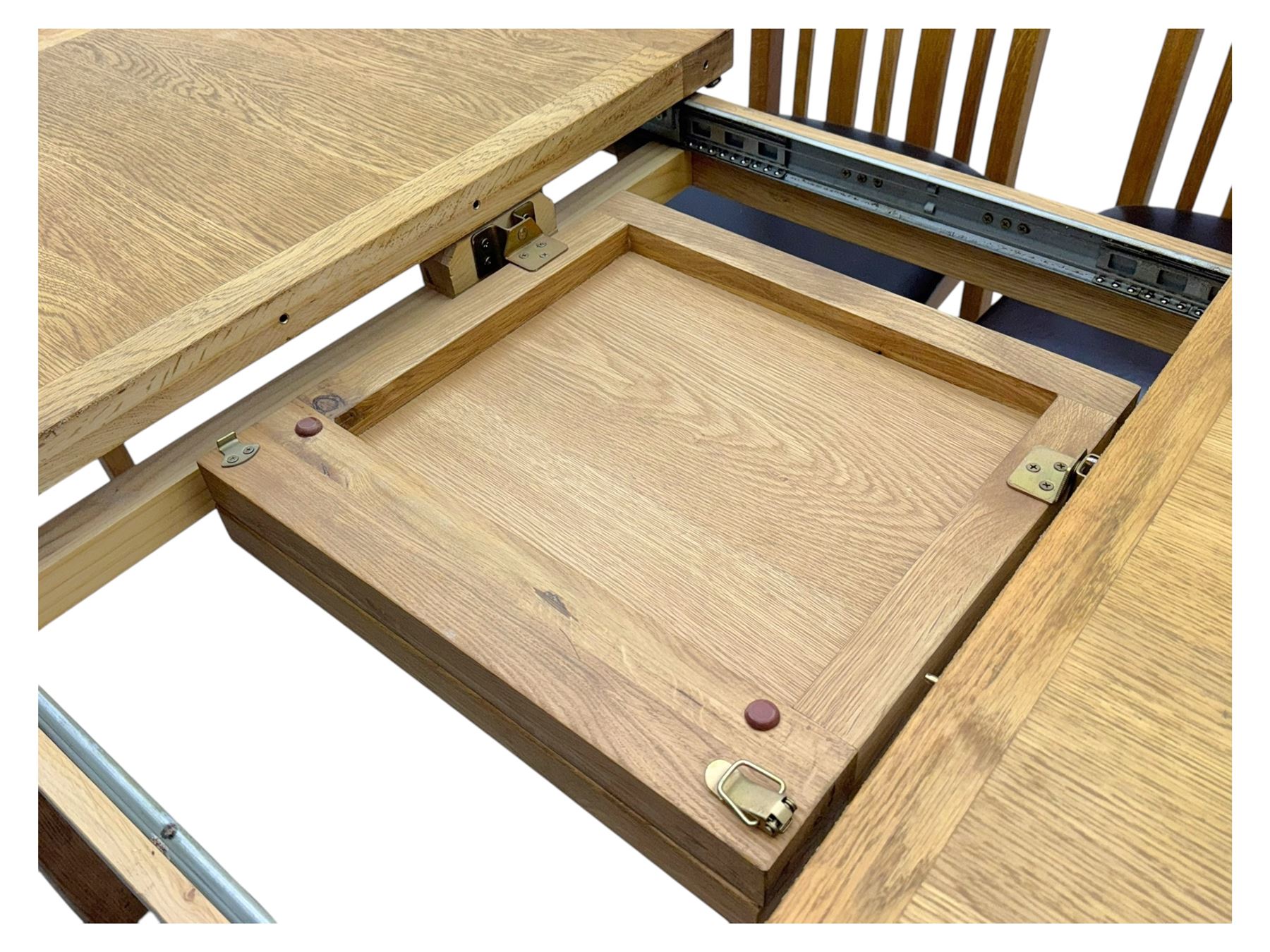 Light oak extending dining table, with four chairs, breadboard ends with integrated fold out leaf with latches, on square supports, tall slatted backrest with brown leather drop in seat  

(Extended 165cm)