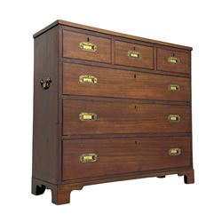 Georgian military type campaign chest, narrow rectangular top over three short and three long drawers, recessed brass handles, on bracket feet