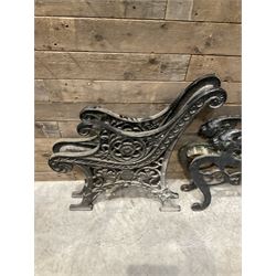 Four pairs of ornate cast iron bench ends (8)