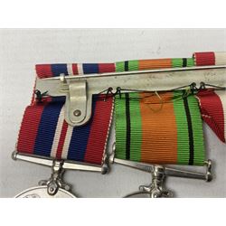 WW2 group of four medals comprising 1939-1945 War Medal, Defence Medal, Italy Star and 1939-1945 Star; with Royal Army Service Corps cap badge and RASC chrome and enamel sweetheart brooch