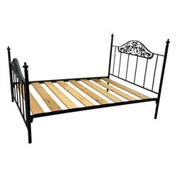 Contemporary metal double bed frame, shaped head and footboards with foliate cast panels and vertical rod supports, the corner posts with urn-shaped finials, finished in a mottled verdigris-style green, with pine slatted base