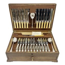 Twelve place setting canteen of cutlery by Lee & Wigfull Ltd, cased in an oak  chest, with key, meat carvers are missing, H18cm, L44cm 