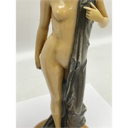 After Ferdinand Preiss (1882-1943), pair of Art Deco style, composite semi nude classical female figures, raised on circular onyx bases, H21cm