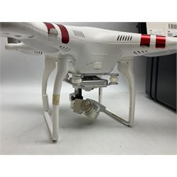 DJI Phantom 2 Vision Plus 3.0 drone, with controller, battery pack, blades, chargers and other accessories in fitted foam lined hard plastic case