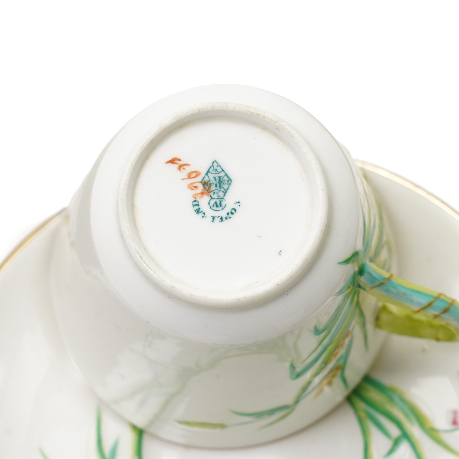 Victorian Copeland part tea service, painted in a Spring pattern with hay and flowers, comprising nine teacups and eleven saucers, teapot, milk jug, two large serving plates and three smaller and twelve side plates