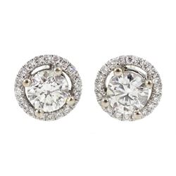 Pair of 18ct white gold round brilliant cut diamond halo stud earrings, total diamond weight approx 0.40 carat